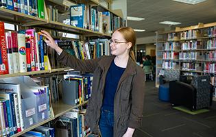 Female Student in Library